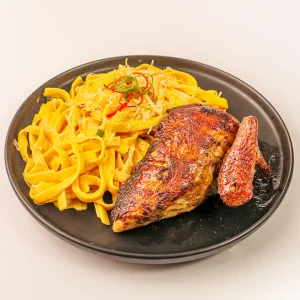 Fetuchini a la Huancaína con 1/4 Pollo